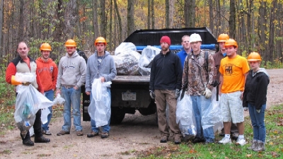 Collecting trash along the Lenny Rd Collecting trash along the Lenny Rd